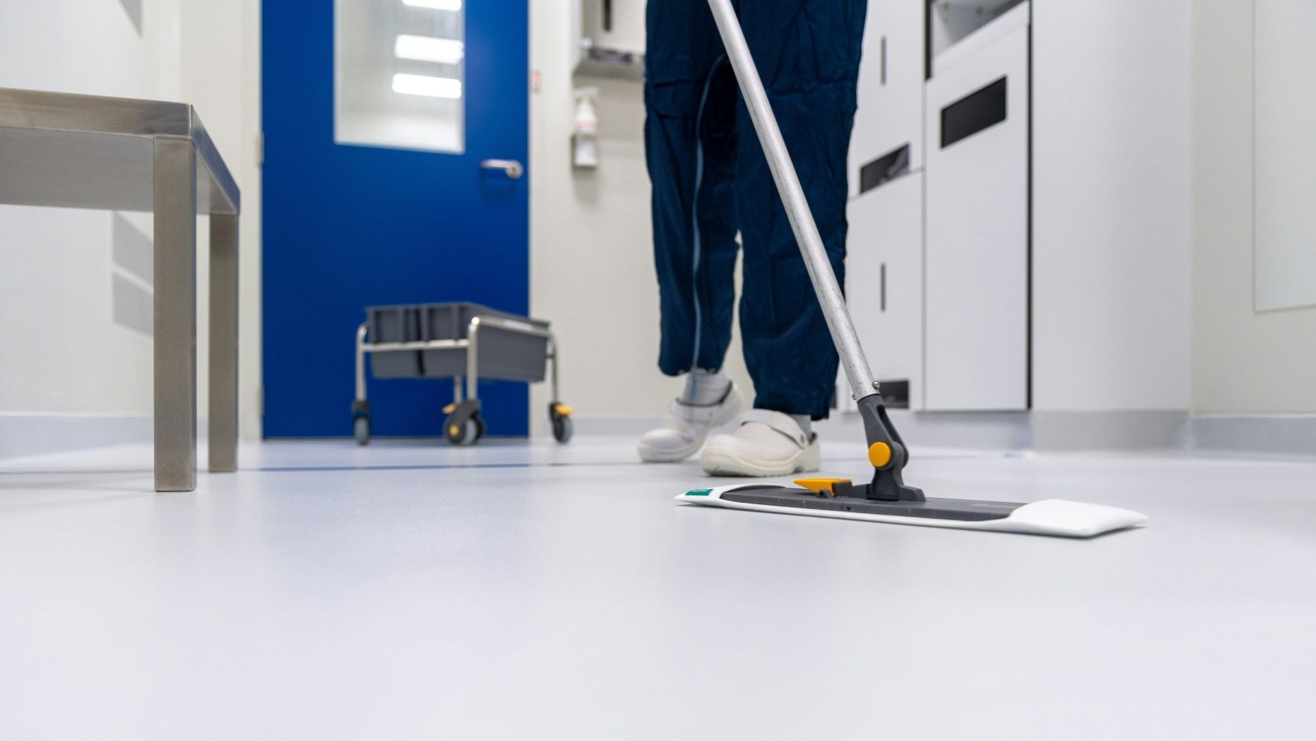 a person scleanign the floor